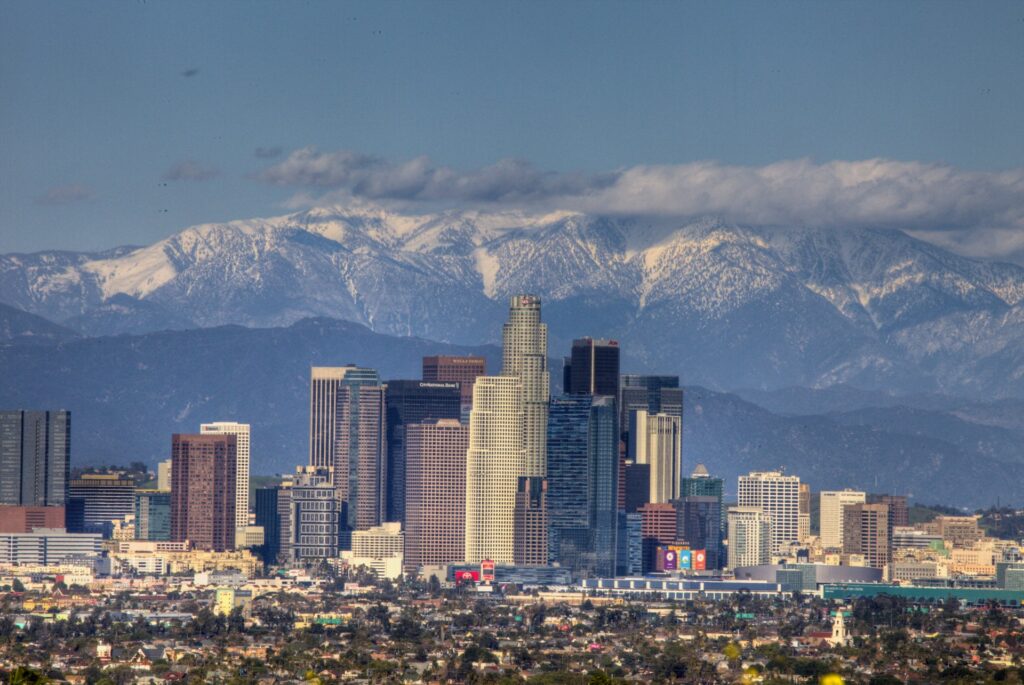 Downtown Los Angeles skyline with San Gabriel mountains in the background