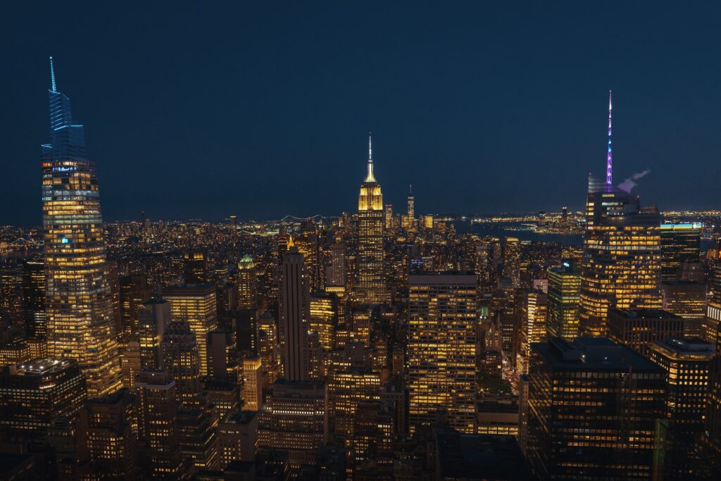 Manhattan skyline illuminated at night with Rockefeller Center view